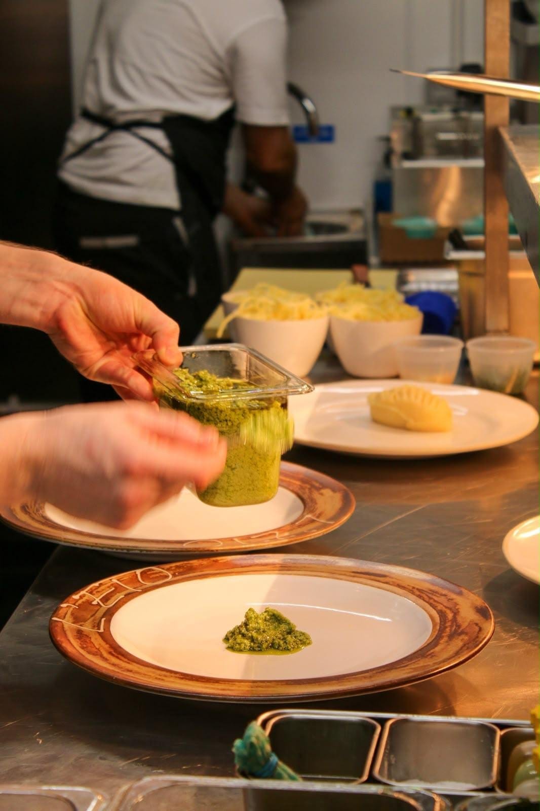 A dish being plated in the Latimers kitchen